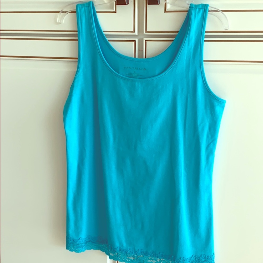 Turquoise tank top with lace at bottom hem
